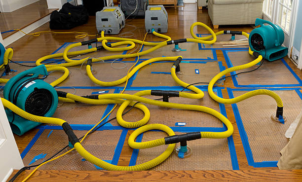 Professional Flood Damage Restoration technician working in Canton, NC